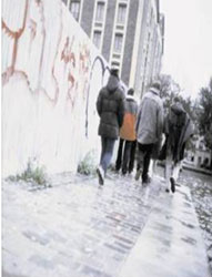 Group of teens walking down a street
