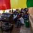 Malians gather around an outdoor television set to watch the semifinal round of the Africa Cup of Nations, in Bamako, Mali, Wednesday, Feb. 6, 2013. (AP Photo/Thomas Martinez)