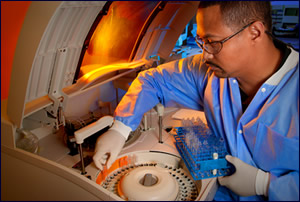 cdc scientist and centrifuge