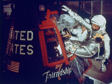 John Glenn enters his Friendship 7 capsule with assistance from technicians to begin his historic flight on Feb. 20, 1962.