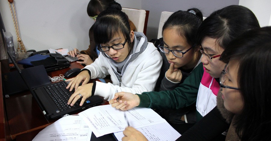 Tech Age Girls work together to develop community project plans in Hanoi, Vietnam, January 17, 2013. [IREX/ GCEVietnam Photo]