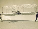 Wilbur Wright flying the 1901 glider. (Courtesy of Special Collections and Archives, Wright State University, Repository # 15-5-16; N542)