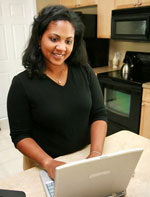 photo of a woman searching on her computer