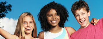 Photo: Three teens smiling