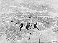 Thumbnail for: Bombs Away-This Fifth Air Force B-26 Invader of the 452nd Bombardment Wing drops its load of general purpose bombs on a vital Communist target in North Korea. Continued interdiction bombing of enemy supply centers, troop concentrations and communication lines is depriving the Communist troops of sorely needed war supplies., ca. 05/29/1951
