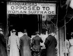 Men looking in the window of the National Anti-Suffrage Association headquarters. [1911(?)]