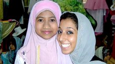 Lynn ElHarake, Fulbright English Teaching Assistants (ETA) to Malaysia, February 2011, with a student at The Muslim Girls&#039; Fashion Club charity show in Terengganu.