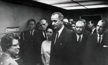 Lyndon Johnson waits to be sworn in as President of the United States 