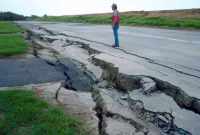 Ground shaking triggered liquefaction in a subsurface layer of sand, producing differential lateral and vertical movement in a overlying carapace of unliquified sand and silt, which moved from right to left toward the Pajaro River. This mode of ground fai