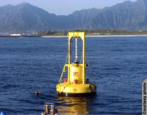 Buoy floating in water (Courtesy of Ocean Power Technolgies)