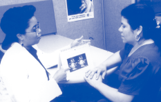 Photo of conversation between Doctor and patient relating to diabetic eye diseases.
