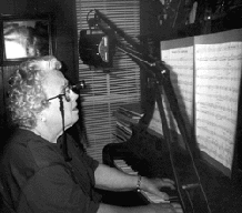 Mary Bailey playing the piano.