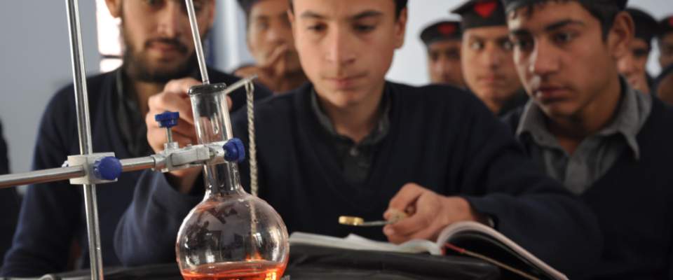 Pakistani students with science experiment