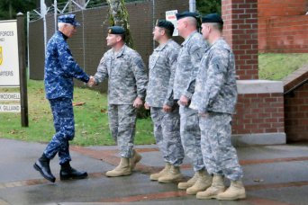 U.S. Pacific Commande Commander Admiral Samuel J. Locklear greets 1st Special Forces Group (Airborne) Commander Col. Robert McDowell, accompanied by 1st SFG (A) Command Sgt. Maj. Frank Gilliand, deputy commander, Col. Max Carpenter, and Chief Warrant Officer Rick Kunz during his visit to Joint Base Lewis McChord, Wash., Feb. 22, 2012. ocklear visited I Corps and 7th Infantry Division to meet his team as the U.S. Military conducts the Pacific re-balance to ensure stabilization in the Indo Asia-Pacific region.