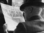 Reading war news aboard streetcar. San Francisco, California. John Collier, December 1941. Library of Congress, Prints and Photographs Division