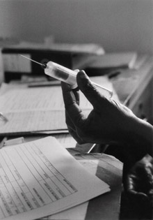 Photo of a syringe being used to test blood for HIV in Zanzibar.