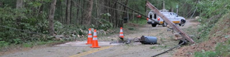 August 28th, 2011. Numerous powerlines are down across a road