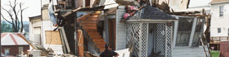 June 2nd, 1998. A man stares at his home destroyed from the tornado.