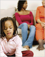 photo of girl playing with mother and grandmother sitting in background