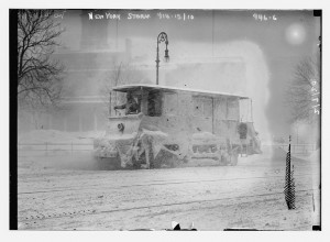 Snow plow during storm, New York