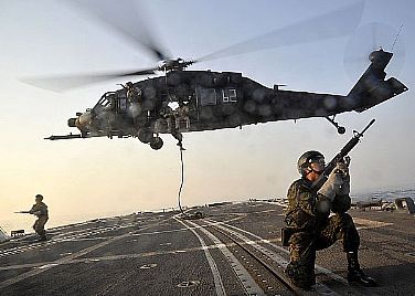 Members of Fuerza de Operaciones Especiales, Peru special operations force, fast rope from a UH-60 Blackhawk helicopter operated by the Army 160th Special Operations Aviation Regiment onto the flight deck of the guided-missile frigate USS Carr (FFG 52) as part of PANAMAX 2010. Special operations forces from Peru, Colombia, Brazil and Panama trained alongside East Coast based Navy SEAL operators as part of the 12-day exercise simulating a multinational effort to defend the Panama Canal.  U.S. Navy photo by Mass Communication Specialist 2nd Class Joseph M. Clark/ Released)  100820-N-8689C-299