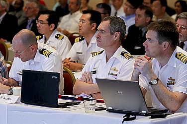 Naval officers from Australia and Japan listen during the 2011 International Standard Missile Users Group conference. The conference was hosted by Naval Surface Warfare Center, Corona Division and brought representatives of international navies together to increase cooperation and improve capabilities.  U.S. Navy photo by Greg Vojtko (Released)  110524-N-HW977-073