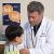 A doctor looks at a child patient.