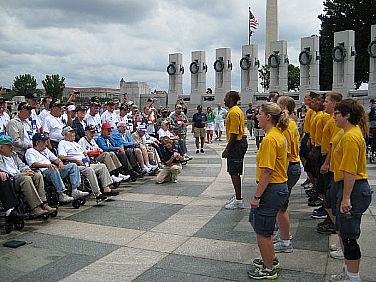 Chief petty officer selects from Naval Weapons Station Yorktown-Cheatham Annex sing 'ÄúAnchors Aweigh'Äù for World War II veterans at the World War II Memorial. The veterans were part of an Honor Flight, and the Honor Flight Network'Äôs mission to bring veterans to Washington, D.C. to visit those memorials dedicated to honor their service and sacrifices.  U.S. Navy photo by Chief Mass Communication Specialist Lucy M. Quinn (Released)  120825-N-TG958-001