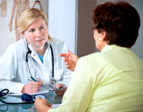 Photo of a doctor talking to a patient