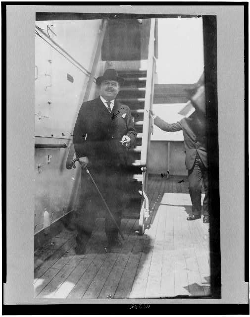 [Victor Herbert, full-length portrait, standing, on the deck of the (ship?) Imperator(?), facing front]