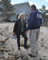 FEMA Community Relations Specialist answer questions in the field