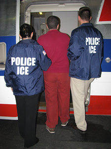 ICE officials arresting man
