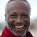 man on beach smiling