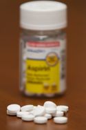 Aspirin Bottle and pills 325 mg Dose