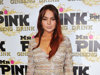 FILE - In this Oct. 11, 2012 file photo, Lindsay Lohan attends the Mr. Pink Ginseng launch party at the Beverly Wilshire hotel in Beverly Hills, Calif.  Lohan's attorney wrote in a letter filed in court on Feb. 22, 2013, that the  actress is willing to record public service announcements and provide inspirational talks at schools and hospitals as a possible way to resolve a case that alleges she lied to police about a car accident. (Photo by Richard Shotwell/Invision/AP, File)