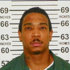 FILE - In this Feb. 1, 2013, photo provided by the New York State Department of Corrections and Community Supervision, Jeffrey Atkins, also known as the rapper “Ja Rule” is shown. Atkins, left a state prison in central New York last week after serving most of his two-year sentence for illegal gun possession, going straight into federal custody in a tax evasion case. (AP Photo/New York State Department of Corrections and Community Supervision)