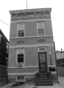 Photograph of a townhouse.