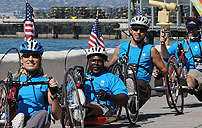 Photograph of veterans riding tricycles