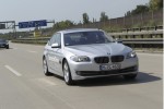 A semi-autonomous BMW 5 Series, on the highway outside of Munich 