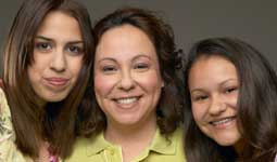 Photograph of three generations of Latina women.