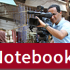 The word Notebook over a photo of a man using a video camera