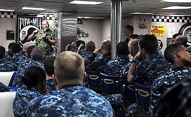 Pacific Fleet Master Chief John T. Minyard holds a question and answer session with Sailors aboard the submarine tender USS Emory S. Land (AS 39). Minyard visited Emory S. Land to support a personnel readiness summit hosted by Joint Region Marianas.  U.S. Navy photo by Mass Communication Specialist Seaman Apprentice Samuel Souvannason/ Released)  120207-N-JS205-044