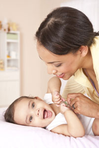 Photo: Mother playing with baby