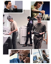 People in an office setting carrying out various duties typical of an office environment