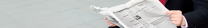 Image: Business Man Reading Newspaper