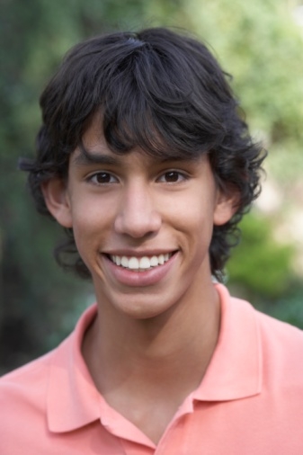 Photograph of a young man smiling.