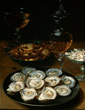 Image: Dishes with Oysters, Fruit, and Wine by Osias Beert the Elder