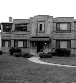 Photograph of an apartment building.