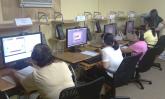 Participants at the Boat People SOS computer center in Bayou La Batre, Ala.