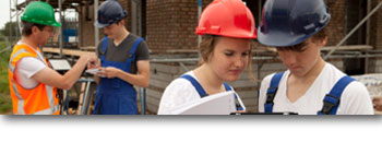 Two teens wearing hard hats